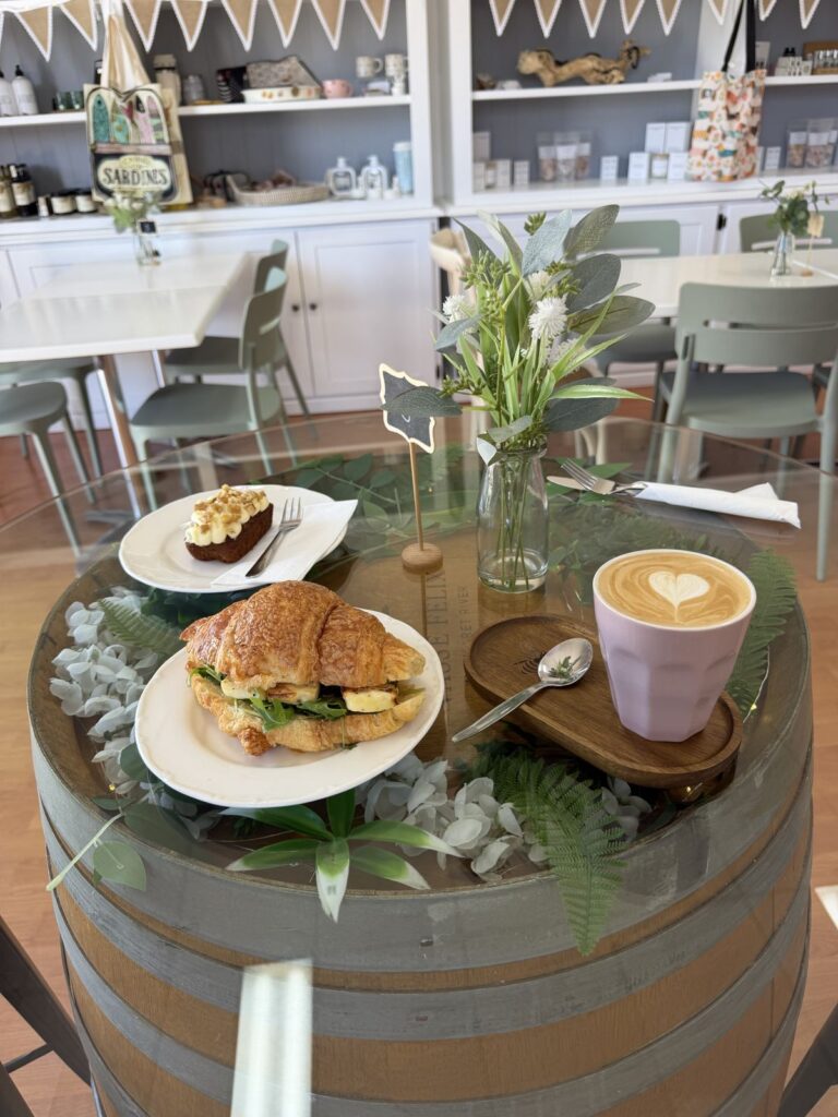 Croissant, coffee and carrot cake on our barrel table